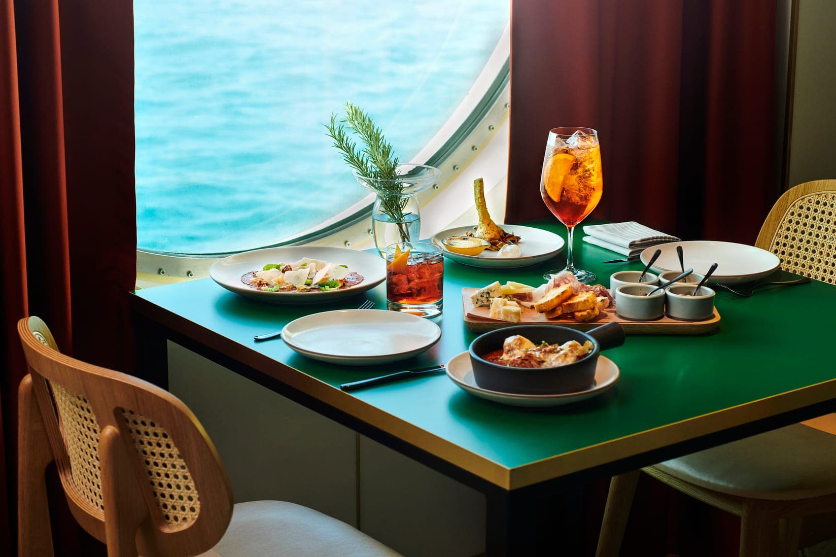 Extra Virgin restaurant table on Virgin Voyages